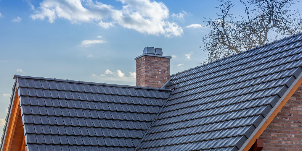 Application d’un traitement hydrofuge sur toiture